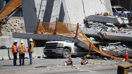 Worker hurt in bridge collapse thinks locking in harness saved his life, cousin says