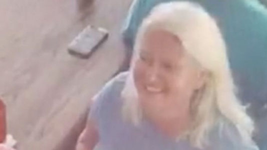 Video shows wanted woman in double murder talking to alleged victim before killing, police say