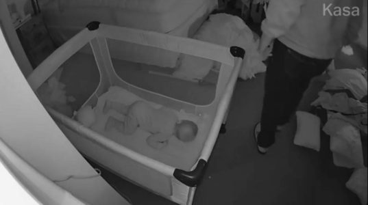 Baby cam video captures home intruder as family sleeps