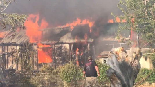 Owners return to charred buildings after wildfire in Utah