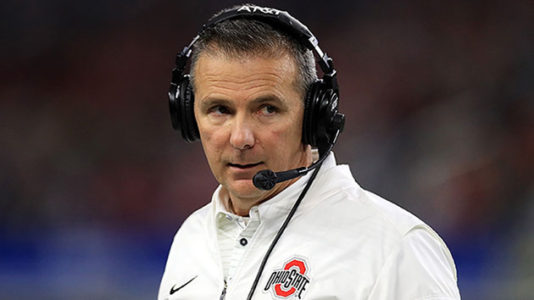 Ohio State football coach placed on leave amid domestic violence investigation