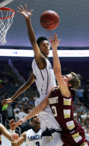 Jakoby Kemp of Layton goes for a block against Jake Walker of Viewmont during boys 5A basketball in Ogden, Friday, Feb. 27, 2015.