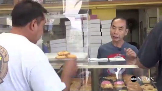 Loyal customers to doughnut shop buy dozens every day to help store owner see his sick wife