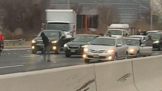 Death-defying drivers clamor for cash spilling out of armored truck on New Jersey highway