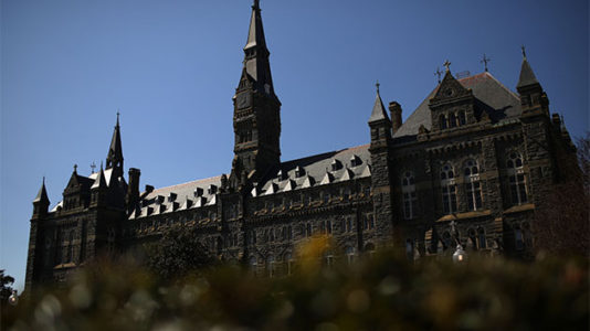 Student paper claims university did not inform them of coach in admissions scandal