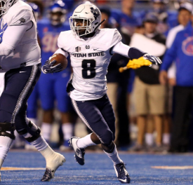 Bright runs for 2 TDs as Utah State beats Nevada 36-10
