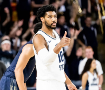 Anderson, No. 15 Utah St. pull away late, beat UNT 68-59