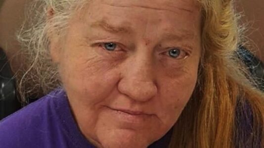 Woman charged with keeping care-dependent sister locked in cage