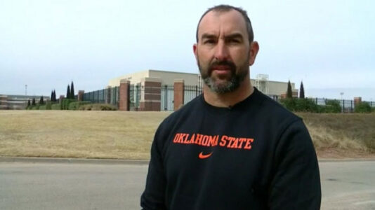 Oklahoma State University employee saves man trapped in a burning truck
