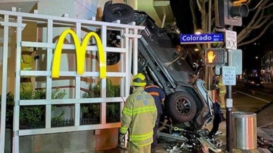 Man lucky to be alive after driving car off six-story parking garage