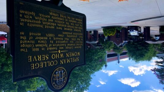 Fifty Spelman grads learn their student debt has been paid