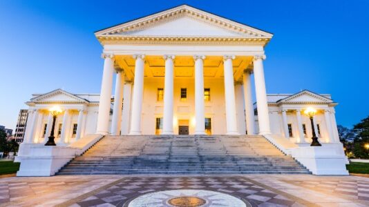 Police declare unlawful assembly as protesters try to tear down Confederate statue
