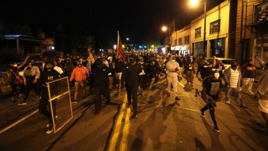 Demonstrators march to Rochester Public Safety Building to protest death of Daniel Prude