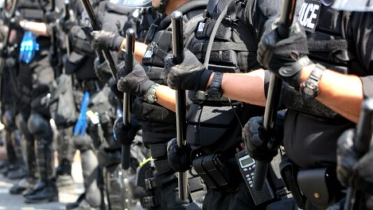 Portland police declare riot on 100th straight night of protests