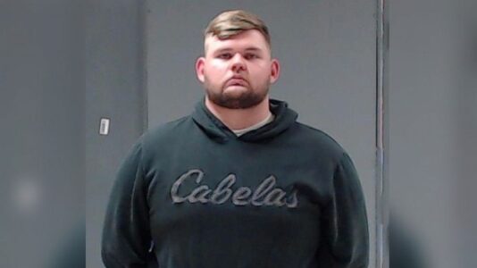 Officer charged in death of Black man who family says was trying to break up dispute