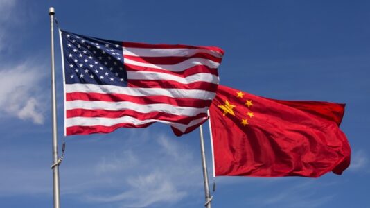 Five arrested, charged as illegal agents for China