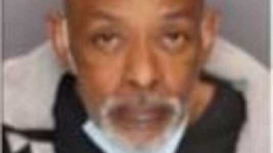 Man, 92, dies of blunt force trauma in motel room, caretaker of 20 years arrested