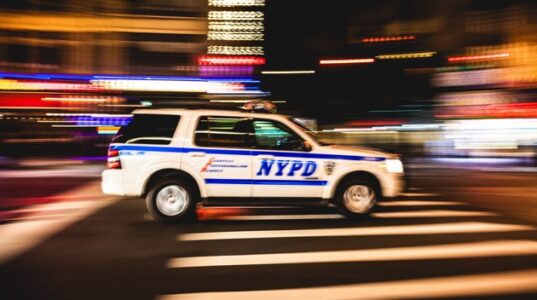 NY passenger bus hangs off overpass in the Bronx after crash, at least 8 left injured