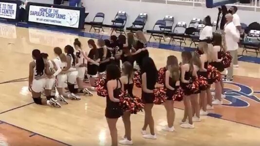 High school sports announcer caught calling girls’ basketball team racial slur as players kneel during anthem