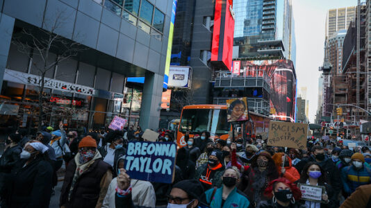 A year after her death, protesters take to the streets to demand justice for Breonna Taylor