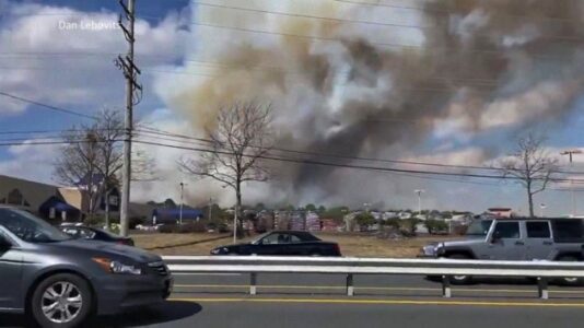 New Jersey brush fire destroys dozens of homes, forces evacuations
