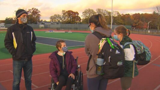 High school track team rallies around teammate with cancer