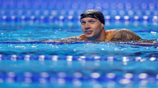 American Caeleb Dressel sets world record in 2nd individual win at Olympics
