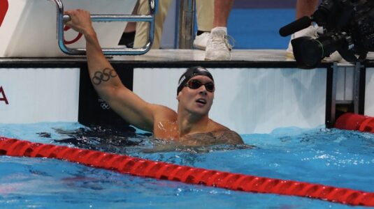 American Caeleb Dressel sets swim Olympic record in Tokyo