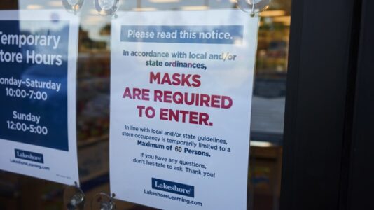 Mask mandates return at local level as some officials defy state rules
