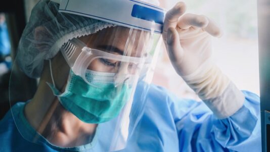 Sick COVID patients lie on floor at antibody treatment site in Florida