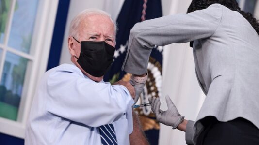 Biden gets COVID-19 booster shot before cameras, pushes vaccinations