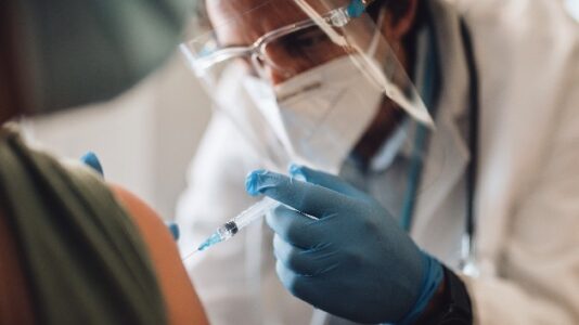 Omicron live updates: CDC signs off, recommends boosters for 16- and 17-year-olds