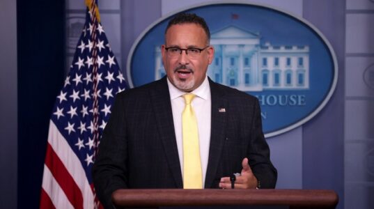 Education secretary urges schools use federal funding to combat teacher shortages