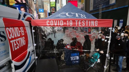 COVID-19 live updates: Airline says omicron surge may create significant disruptions