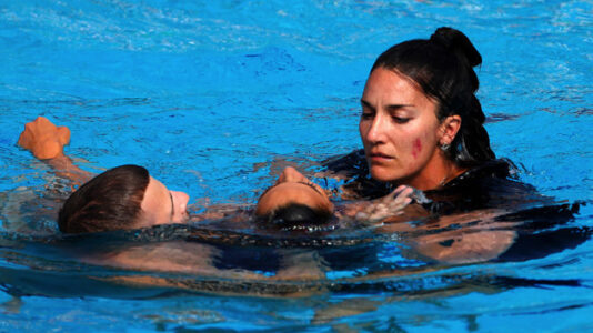 US swimmer rescued by coach from bottom of pool after fainting in World Championship