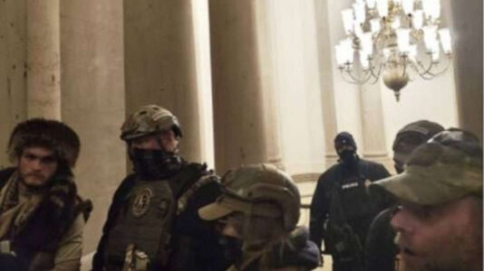 Capitol Police officer disputes claims that Oath Keepers were seen protecting him during Jan. 6 attack