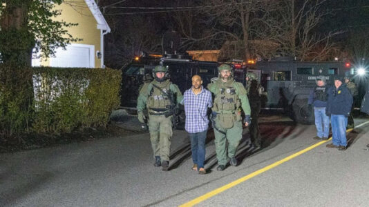 Chainsaw-wielding man storms police station, holds two children hostage before arrest, police say