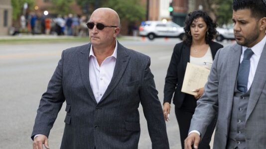 Dad of Highland Park shooting suspect pleads not guilty to reckless conduct charges
