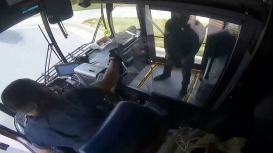 Dramatic footage shows shootout between bus driver, passenger