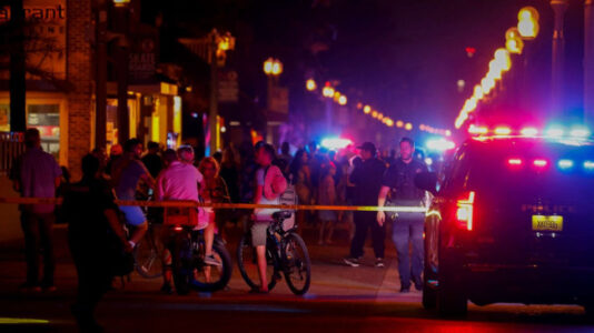 Police search for remaining suspect after nine injured in shooting at Florida beach