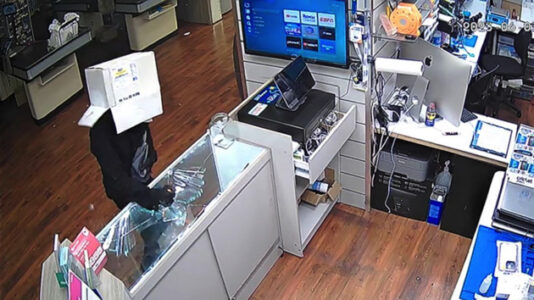 Surveillance video shows box-wearing bandit allegedly burglarizing Florida grocery store