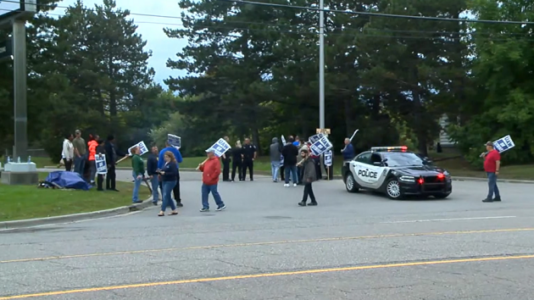 Multiple striking auto workers struck by car outside Michigan plant