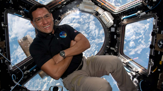 NASA astronaut breaks record for longest trip to space by an American