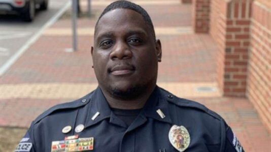 Police officer pulls unconscious driver from burning truck in dramatic video