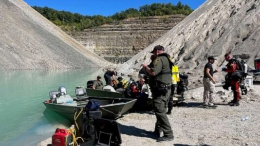 Dump truck driver plummets hundreds of feet into quarry pit when vehicle slips off cliff