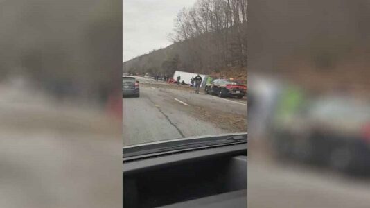 At least one dead, nearly two dozen injured after tour bus rolls over on upstate New York highway