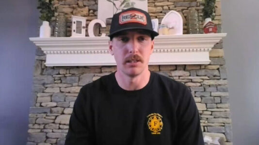 Hero firefighter describes rescue of semitruck driver dangling from bridge