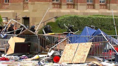 The remnants of an encampment are seen on the campus of UCLA in Los Angeles after a police raid led to the arrests of more than 100 pro-Palestinian protesters, Thursday, May 2, 2024. Via KABC