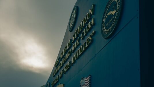 Housing migrants at Guantanamo Bay comes with challenges, national security expert says