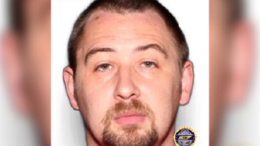 As search for prime suspect goes on, 2 more people charged in Tennessee quadruple killing